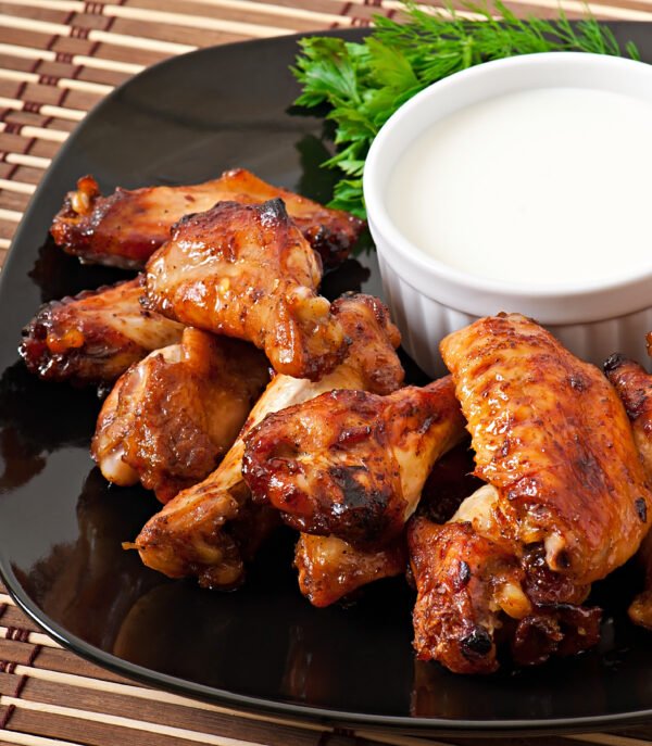 Baked chicken wings in the Asian style Deli Wings